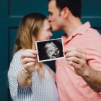Couple announcing pregnancy